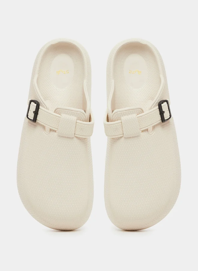 Styli Textured Buckle Embellished Slip On Sandals