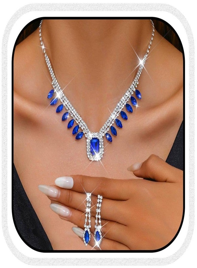 يونيكرا طقم مجوهرات زفاف مرصع بأحجار الراين من يونيكرا، طقم قلادة وأقراط فضية، طقم مجوهرات كريستالية رسمية لحفلات التخرج للنساء والعرائس (أزرق) - Image 1