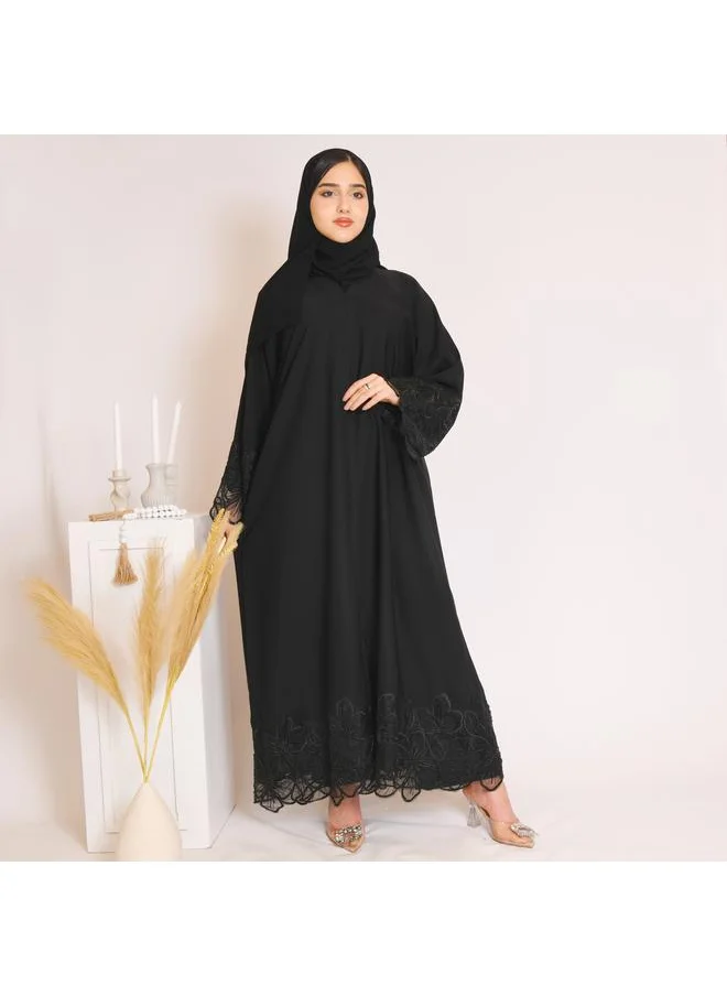 HAWRAA ABAYA Black abaya with closed buttons and decorated with embroidery on the sleeves and bottom of the abaya