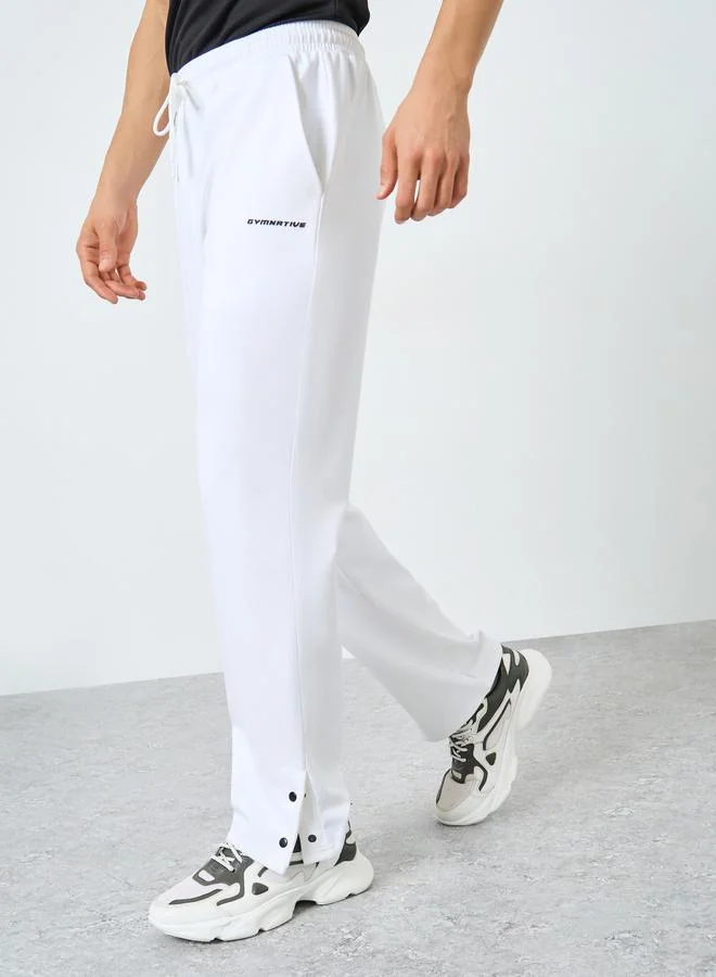 Styli Active Relaxed Fit Open Hem Scuba Pants With Bottom Snap Detail