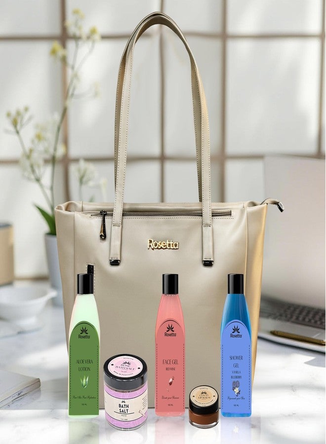 روزيتا مجموعة هدايا روزيتا للعناية بالبشرة الفاخرة مع حقيبة حمل - جل استحمام، لوشن الصبار، جل الوجه بخلاصة النبيذ الأحمر، ملح استحمام بخلاصة الورد، مرطب شفاه بخلاصة الكاكاو - مجموعة تدليل 5 في 1 للنساء - لون أبيض كريمي - Image 1
