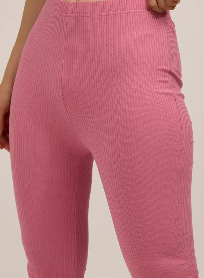 OUTZIDR  Pink Ribbed Basic Flared Leggings for Women | Best Price UAE