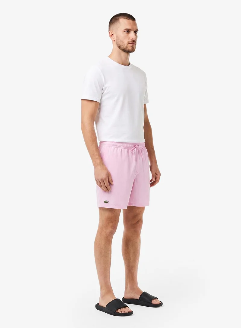 Lacoste  Monochrome Swim Trunks for Men | Best Price UAE