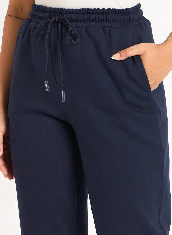 Femmella  Women Navy Blue Fleece Joggers for Women | Best Price UAE