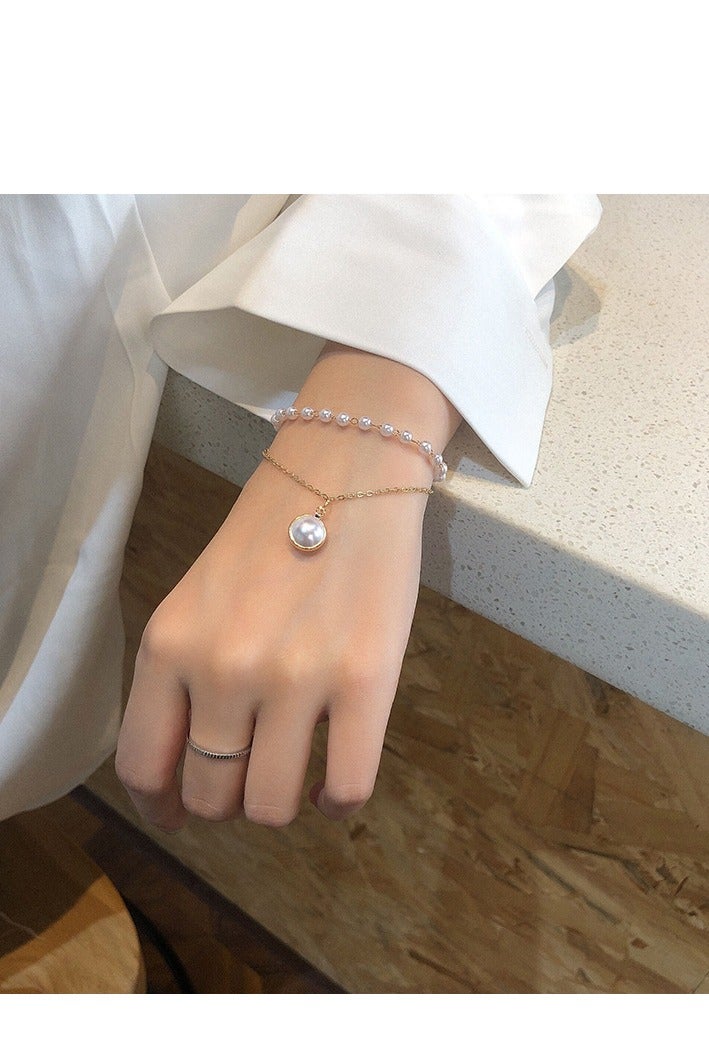 Korean-style minimalist pearl pendant double-layer necklace and bracelet for women, with a modern and slimming design, featuring a unique small-scale design.one size