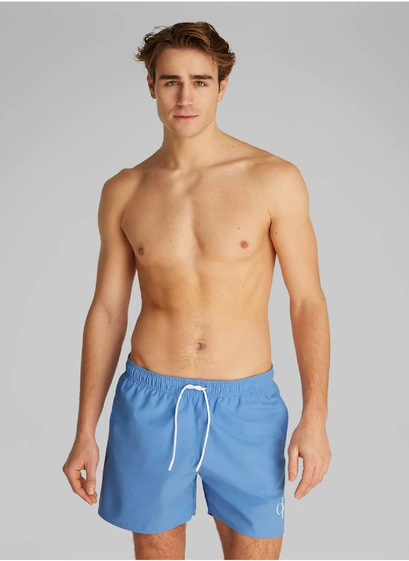 Calvin Klein Jeans Men's Medium Drawstring Swim Shorts - CK Monogram - Polyester, Blue