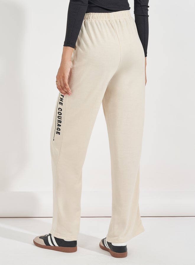 Styli Slogan Print High Rise Wide Leg Joggers  - Image 4
