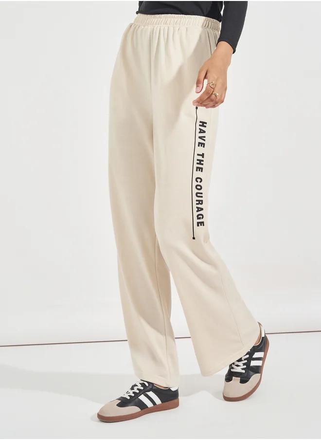 Styli Slogan Print High Rise Wide Leg Joggers