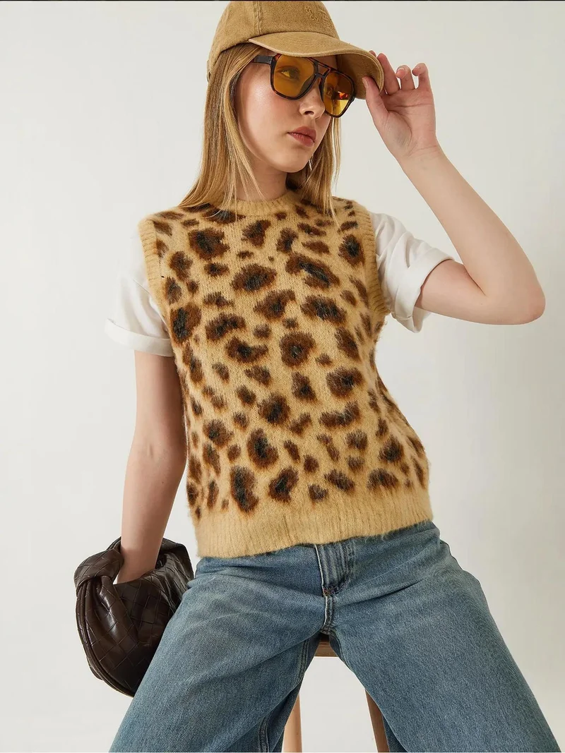 بيانكو لوتشي سترة صوفية محبوكة بنقشة الفهد من لوتشي