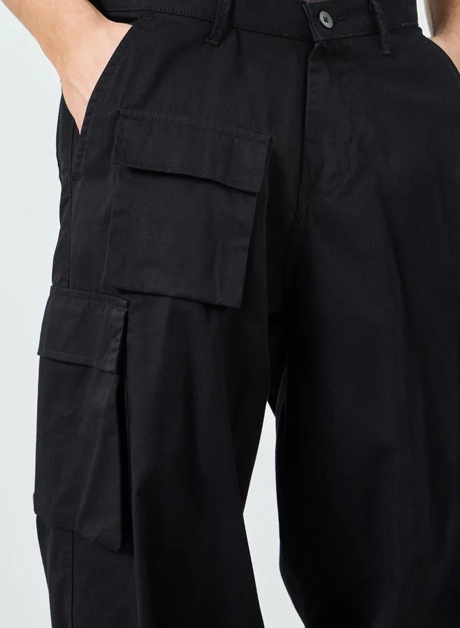 Styli  Men Black Woven Cotton Baggy Pants for Men | Best Price UAE