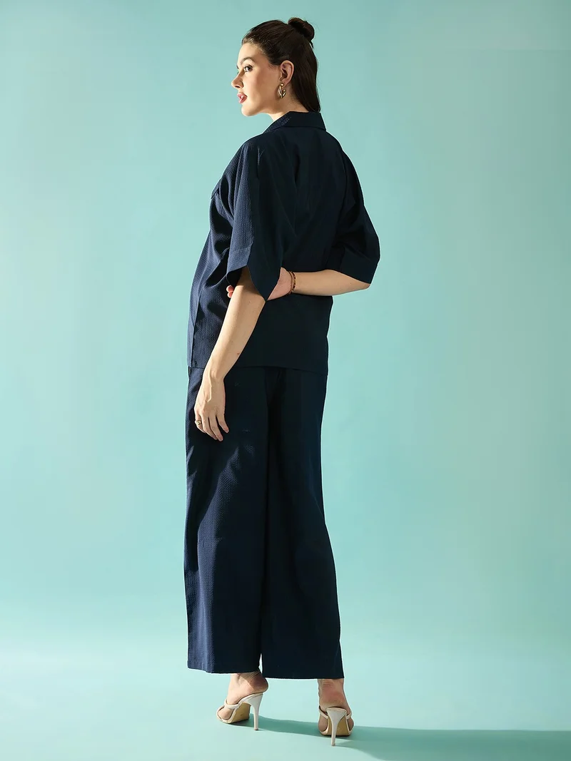 بانيت طقم متناسق (Co-ord Set) قميص فضفاض (Oversized) من قماش السيرساكر (Seersucker) مع بنطلون