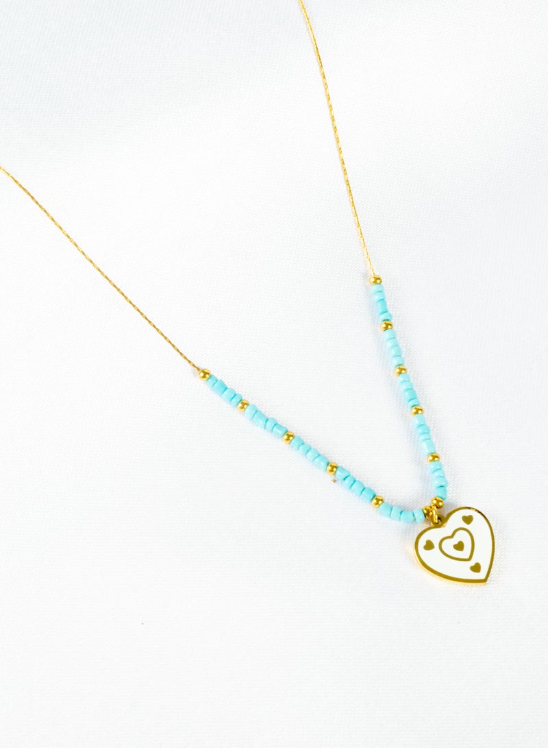 The Black Pearl Accessories Stainless Steel Necklace Gold With Turquise Beads and White Heart Pendant - Image 3