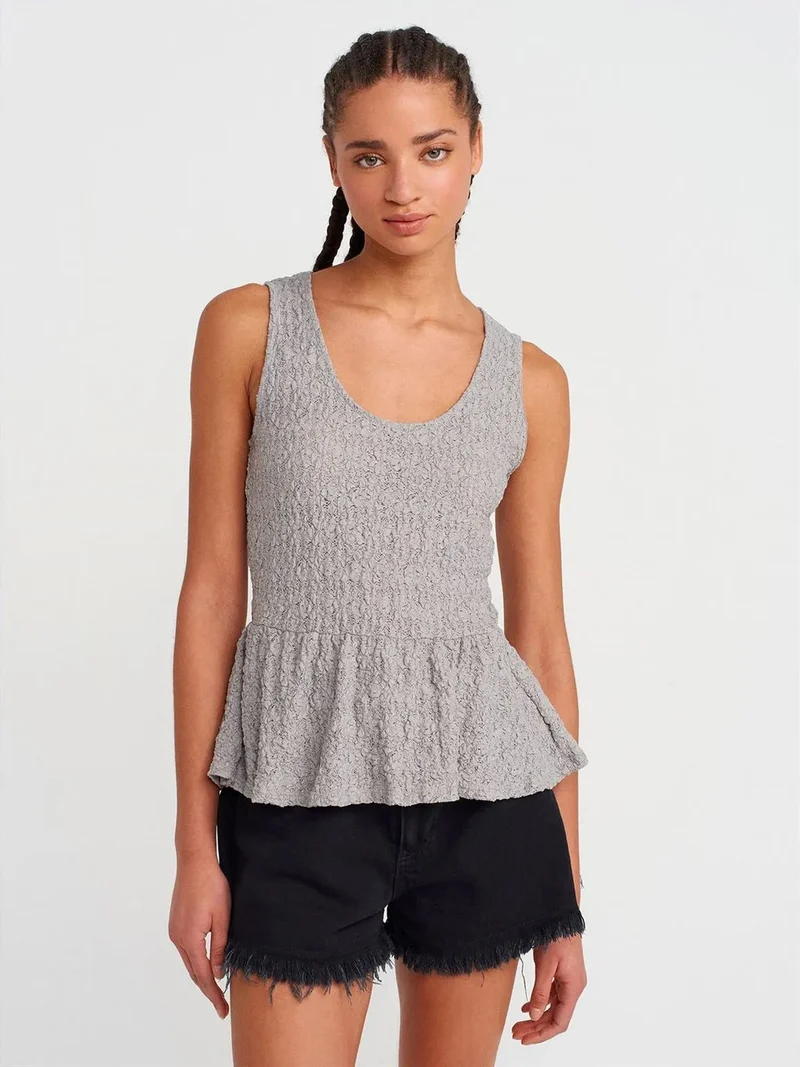 ديلفين Dilvin Textured Lace Peplum Blouse