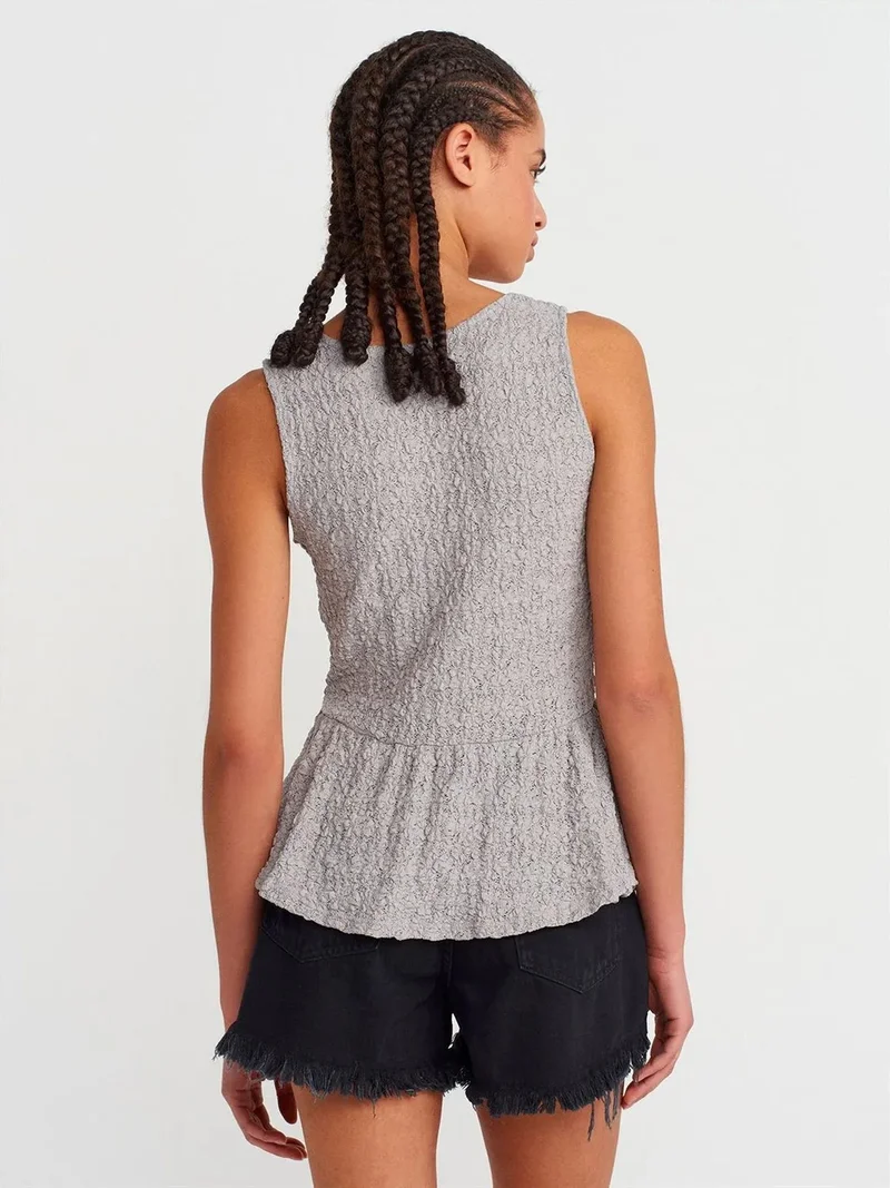 ديلفين Dilvin Textured Lace Peplum Blouse