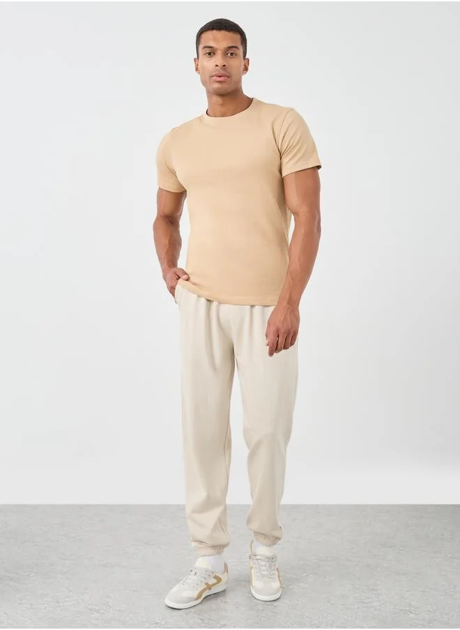 ستايلي Styli Typography Embossed Oversized Elasticated Cuffed Joggers