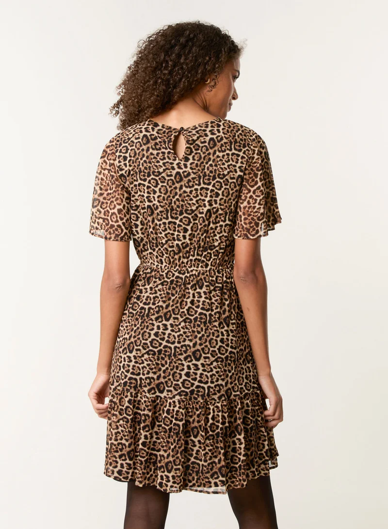 بلو فانيلا Leopard Print Mesh Crew Neck Mini Dress