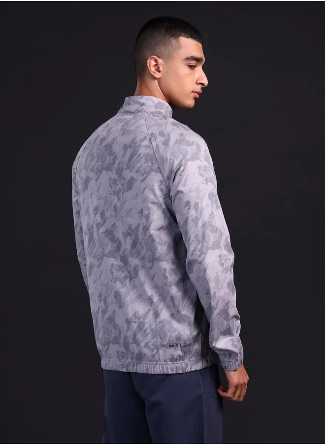 تكنوسبورت Men Printed Slim Fit Mock Neck Sports Jacket with TS FLEXI by Styli