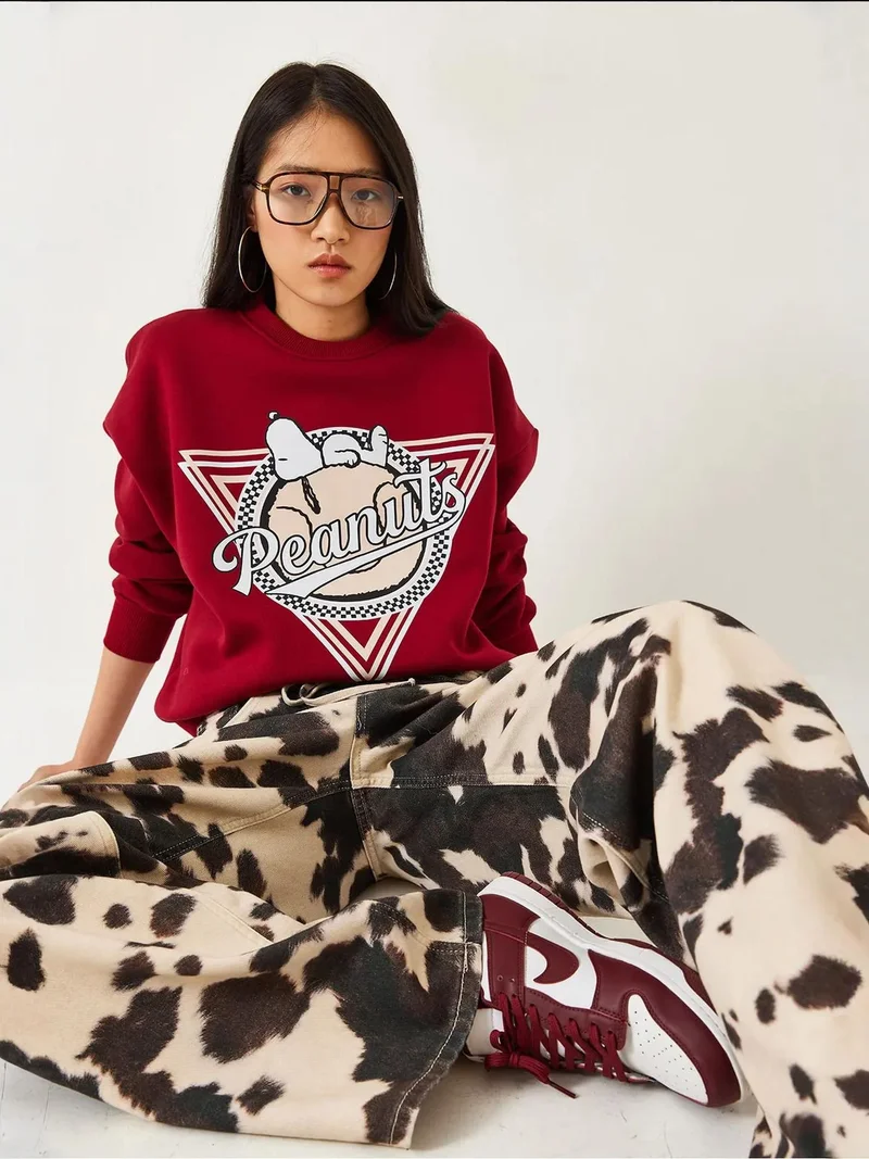 بيانكو لوتشي بلوفر لوكسي مطبوع بأكمام طويلة وياقة دائرية