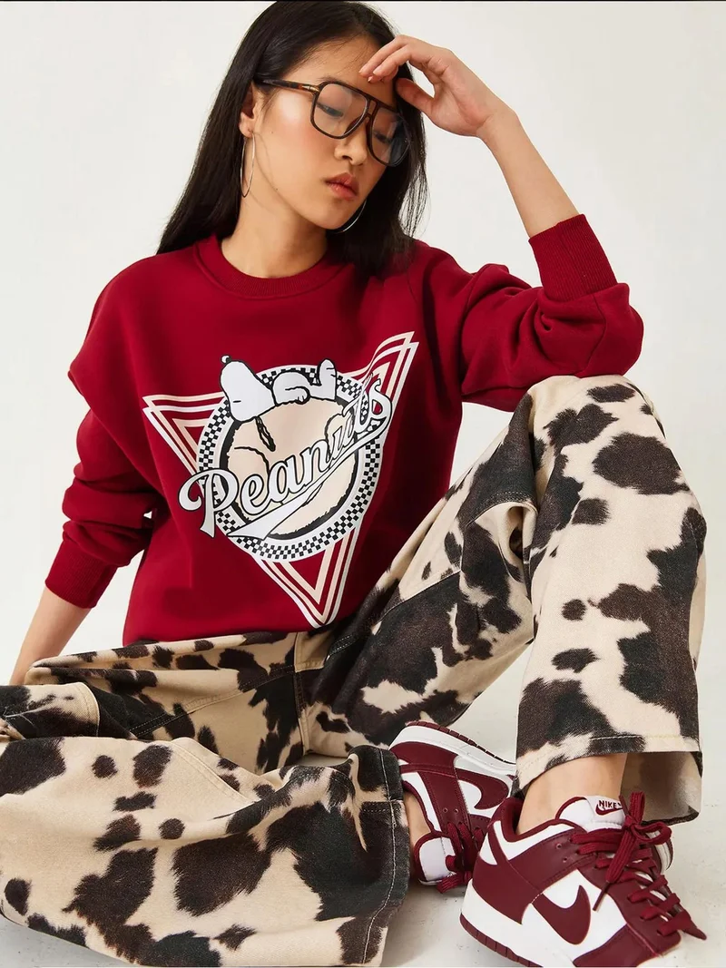 بيانكو لوتشي بلوفر لوكسي مطبوع بأكمام طويلة وياقة دائرية