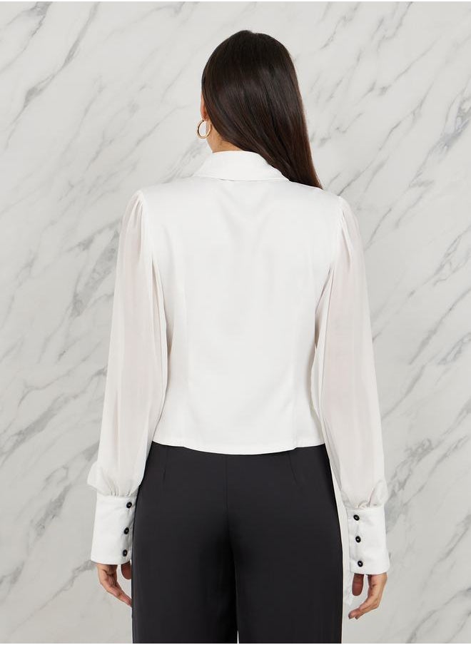 Styli - Sheer Sleeves Asymmetric Hem Button Detail Shirt - Image 1