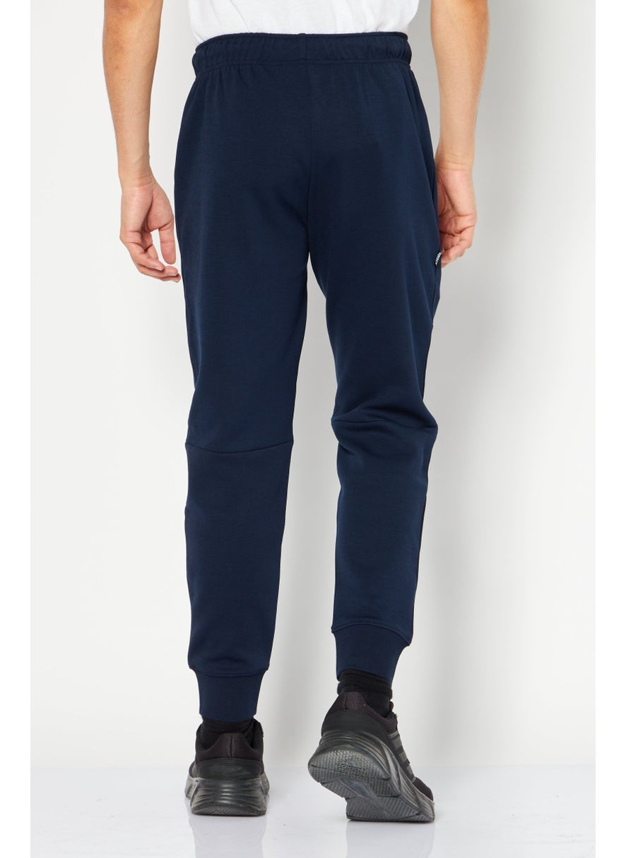 DKNY Sport Men Sportswear Fit Brand Logo Training Jogger Pant, Navy Blue  - Image 4