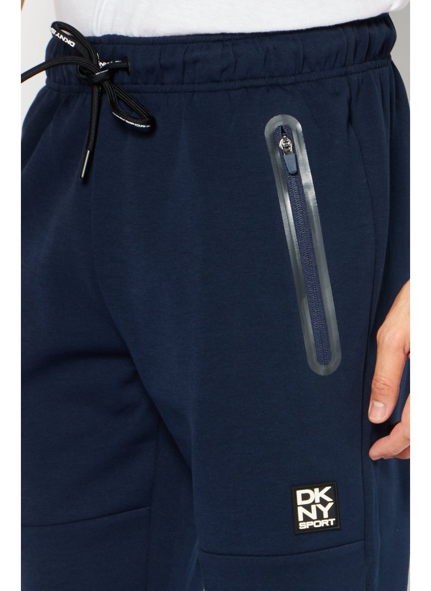 DKNY Sport Men Sportswear Fit Brand Logo Training Jogger Pant, Navy Blue  - Image 2