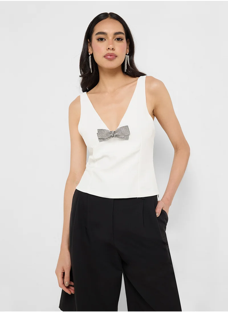 جينجر V Neck Diamante Bow Detail Top