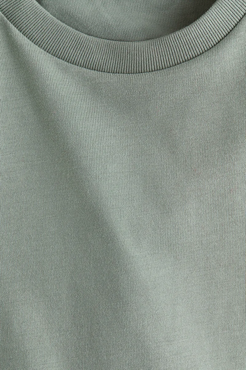 اتش اند ام تي-شيرت واسع من قطن بيما