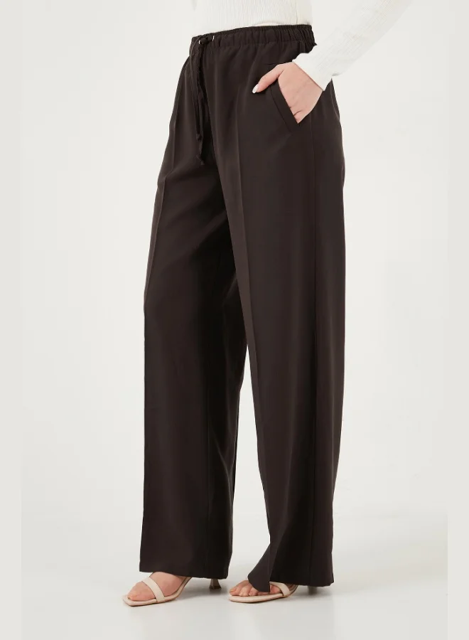 Lela  Lela Relaxed Fit High Waist Wide Leg Tie-Up Trousers Women's Pants 6923874 for Women | Best Price UAE