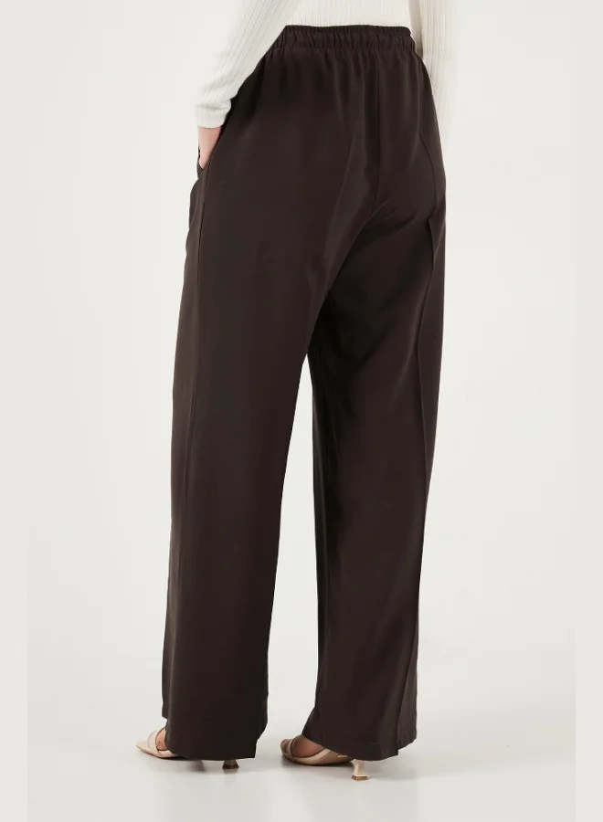 Lela  Lela Relaxed Fit High Waist Wide Leg Tie-Up Trousers Women's Pants 6923874 for Women | Best Price UAE