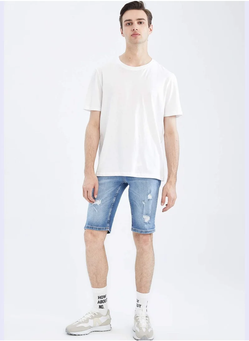 ديفاكتو Slim Fit Distressed Midi Jean Shorts