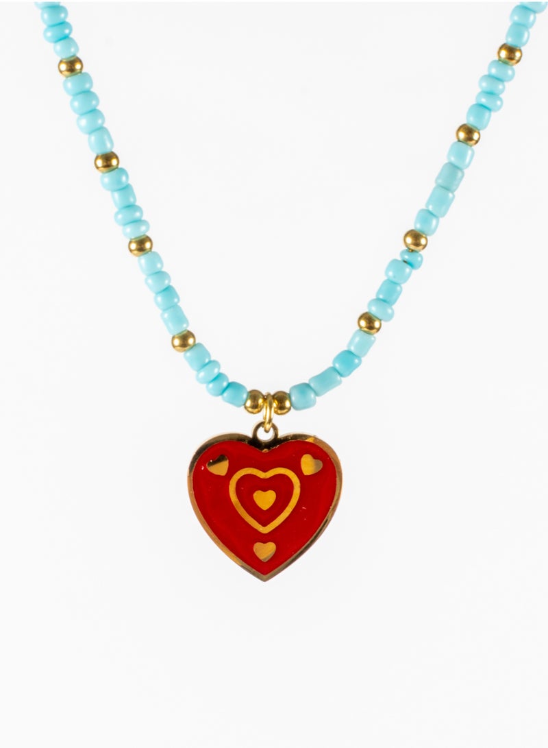 The Black Pearl Accessories Stainless Steel Necklace Gold With Turquise Beads and Red Heart Pendant - Image 1