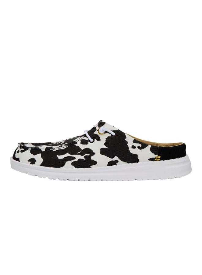 HEYDUDE Hey Dude Wendy Slip Classic White/Black Cow Print Size W9 | Women's Shoes | Women's Slip On Loafers | Comfortable & Light-Weight - Image 1