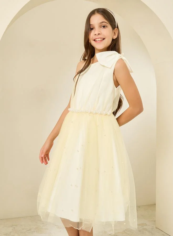 ستايلي فستان مزين باللؤلؤ