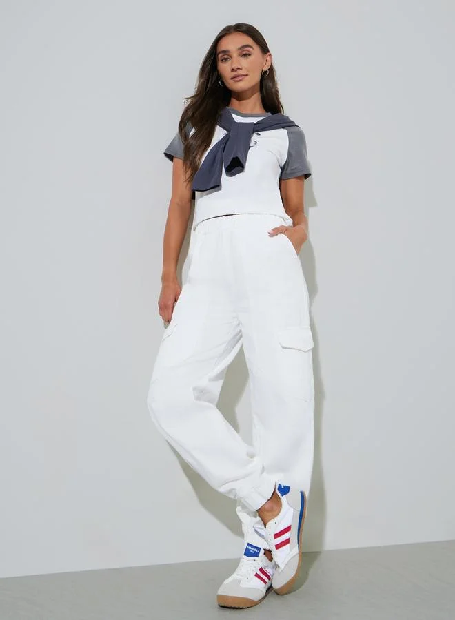Styli  White Solid Mid-Rise Cuffed Cargo Jeans for Women | Best Price UAE