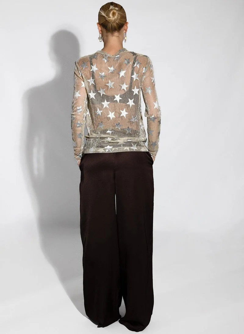 جانارا جونز Golden Shimmering Mesh Silver Stars Teresa Top