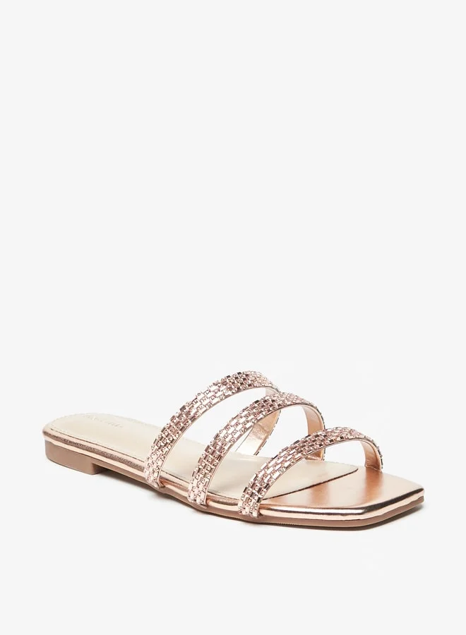 فلورا بيلا من شو إكسبرس Women's Embellished Slip-On Flat Sandals