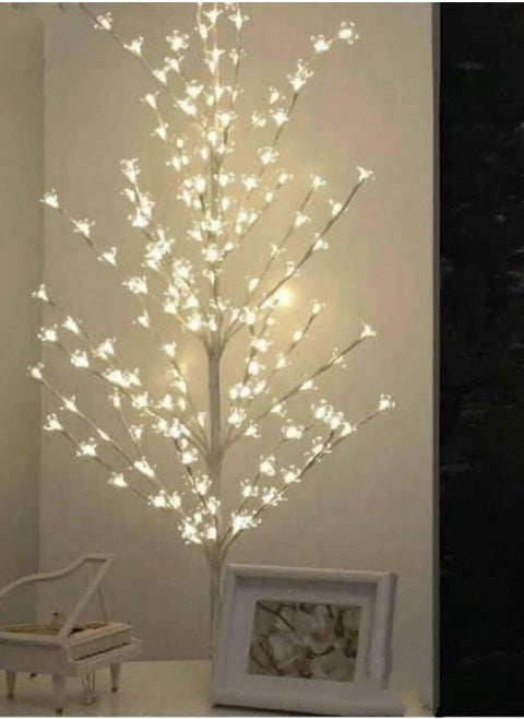 A white illuminated tree for decoration