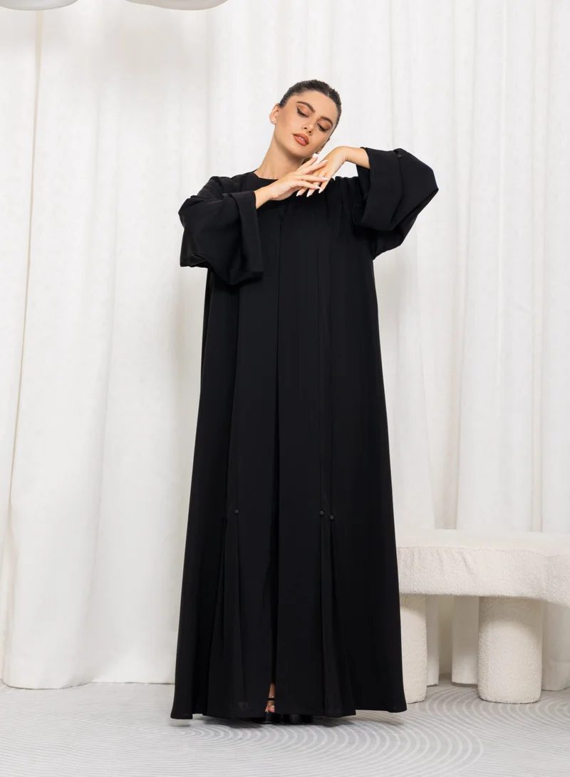 نيكياس عباية ندى سوداء بكشكشة وأزرار سفلية وأكمام