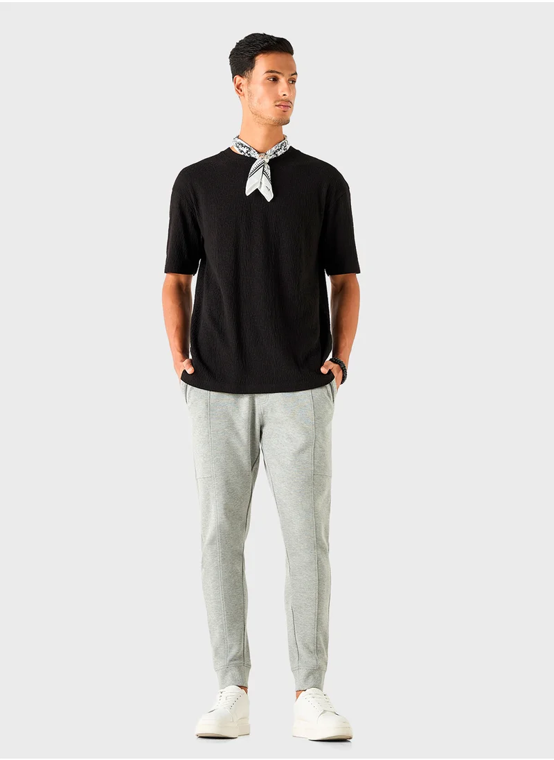 ايكونيك Iconic Textured Joggers with Drawstring Closure an