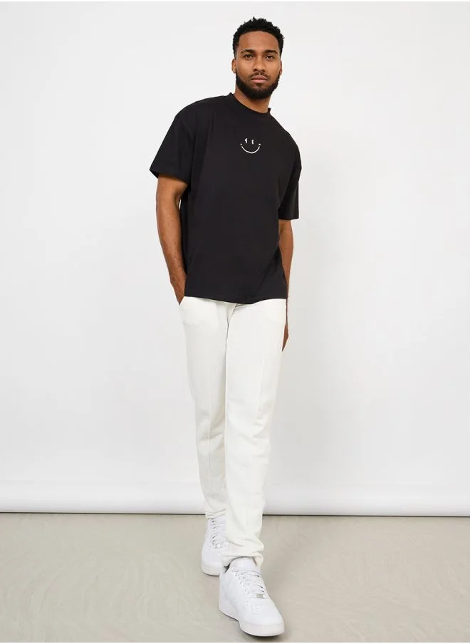 Styli Oversized Minimal Emoji Chest Print T-shirt