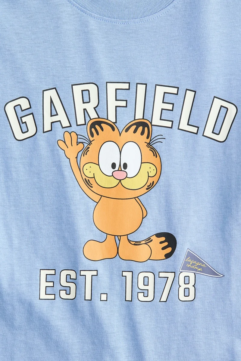 اتش اند ام تي-شيرت فضفاض بطبعة مميزة