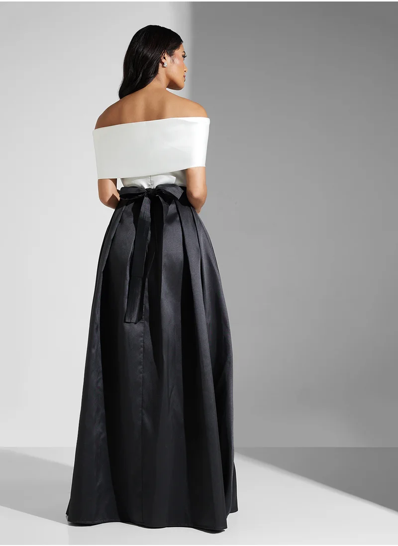 Namshi x Monochrome Off Shoulder Fown With Box Pleat Detail