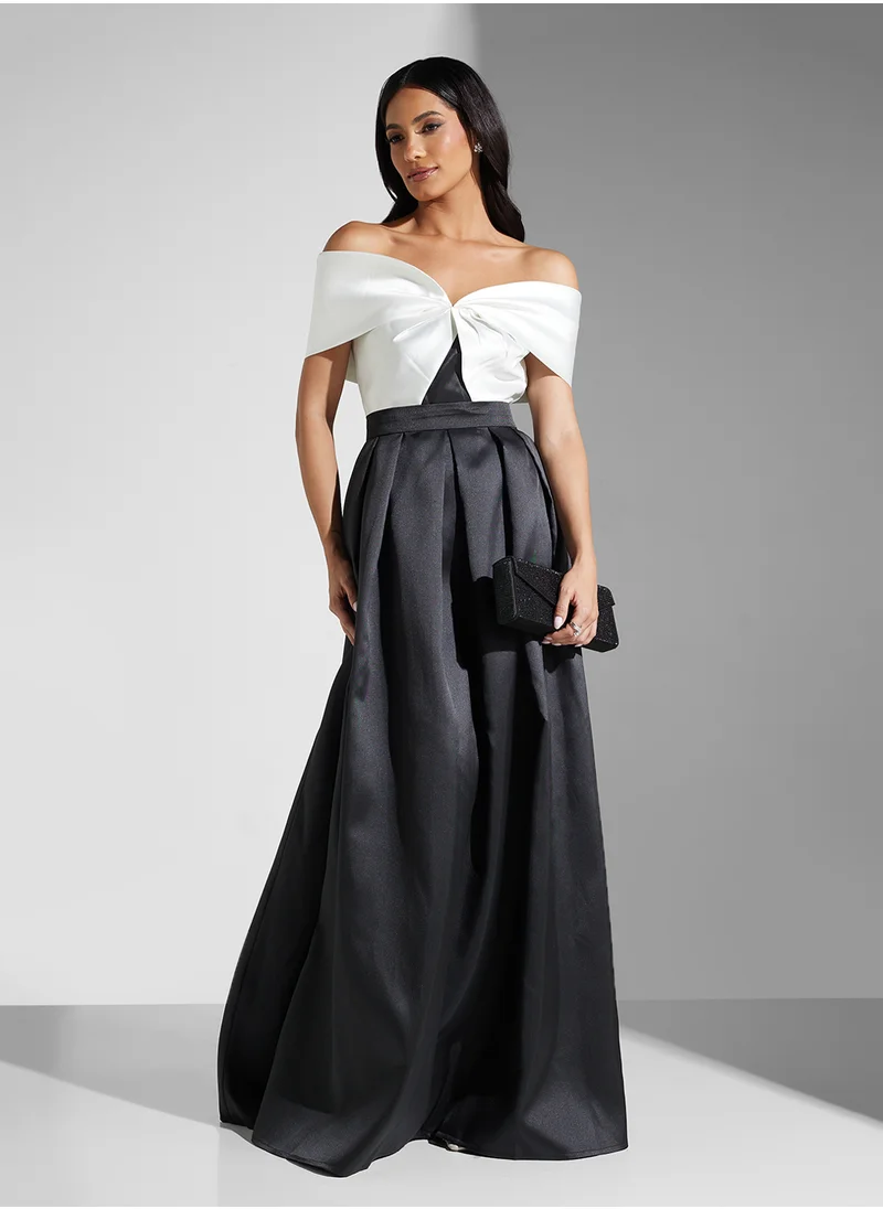Namshi x Monochrome Off Shoulder Fown With Box Pleat Detail