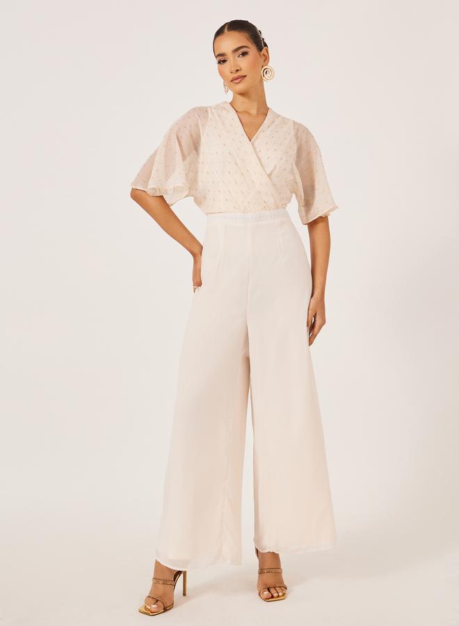 Styli Textured Dobby V-Neck Jumpsuit  - Image 1