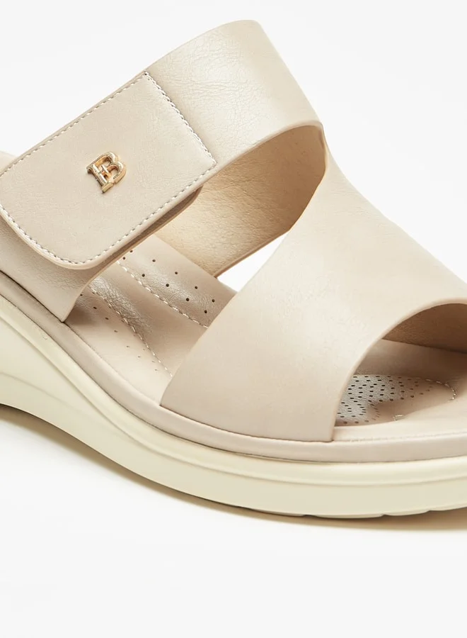 فلورا بيلا من شو إكسبرس Women's Solid Slip-On Sandals With Wedge Heels