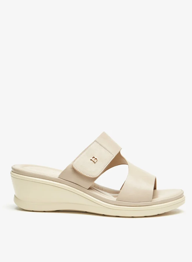 فلورا بيلا من شو إكسبرس Women's Solid Slip-On Sandals With Wedge Heels