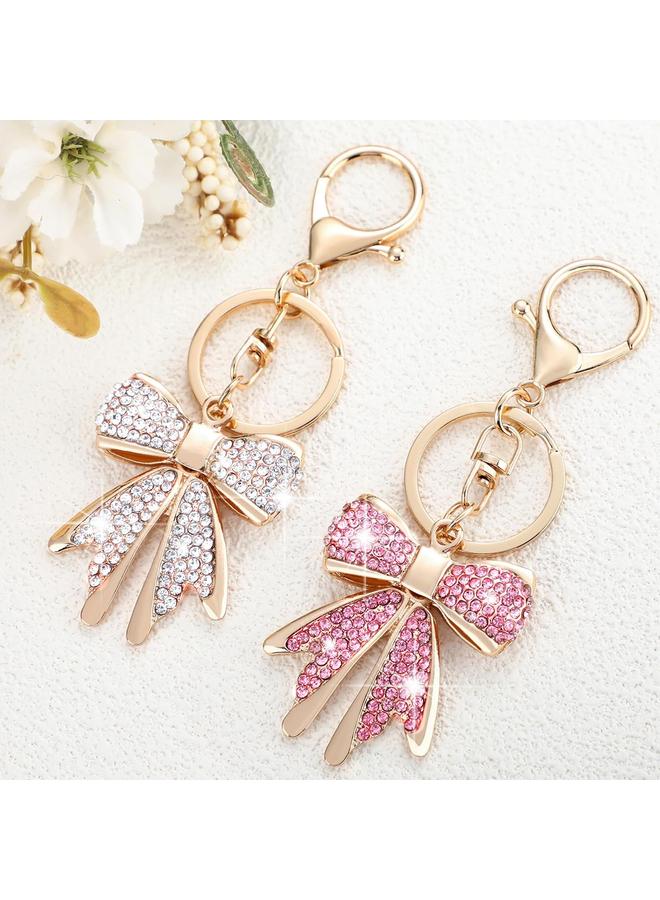 الأزرق جي دبليو 2 قطعة من الذهب الوردي القوس سلسلة المفاتيح للنساء حجر الراين القوس مفتاح سلسلة سباركلي كوكيت القوس حقيبة سحر لطيف القوس محفظة سحر اكسسوارات للسحر الرئيسية محفظة حقيبة يد حقيبة ظهر، هدايا عيد الميلاد القوس للنساء - Image 3