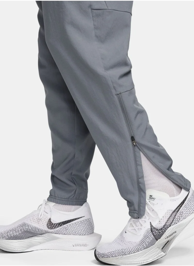Nike Dri-Fit Challenger Woven Pants