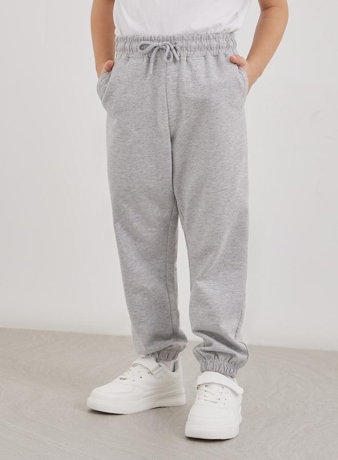 Styli School Uniform Grey Cotton Cuffed Joggers with Pockets - Image 1